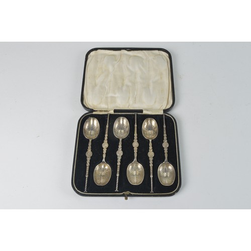 24 - A Set of Six Silver Anointing Spoons in Case after the Antique.