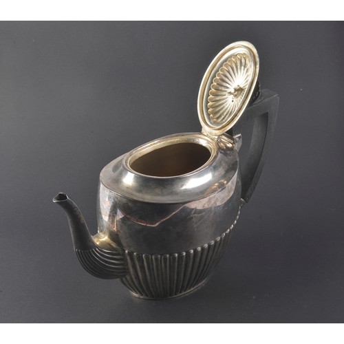 30 - A Victorian Silver Half Wing Fluted Tea Pot with an Ebony Handle, Maker: J E B, London H. Weighing 6... 