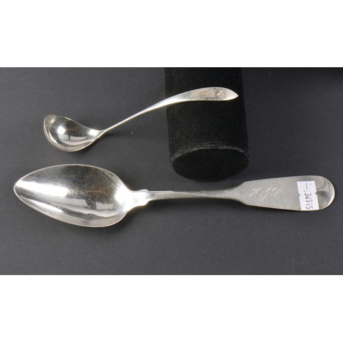 42 - A Continental Silver Table Spoon & an American Horseradish Spoon. Weighing: 60 grams.