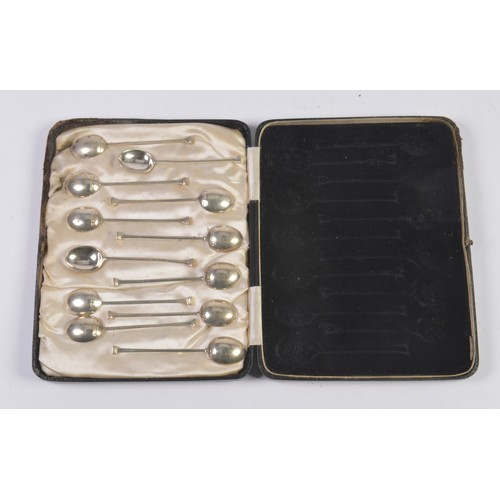 63 - A Set of 12 Silver Seal Topped Coffee Spoons in Case.