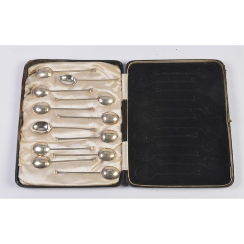 63 - A Set of 12 Silver Seal Topped Coffee Spoons in Case.