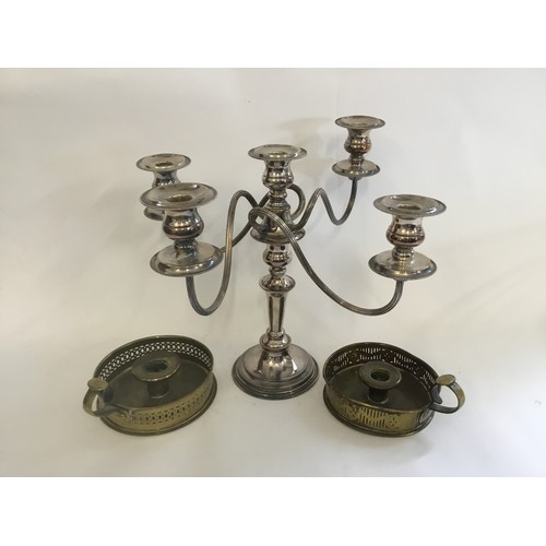 71 - A Four Branch Candelabra & two Chamber Candle Sticks in Brass.