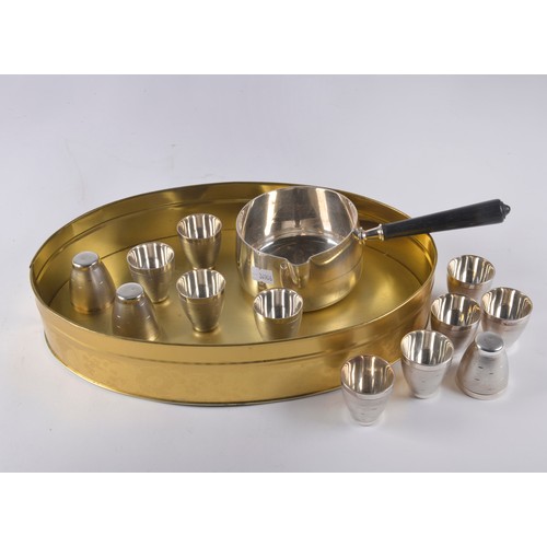 80 - A Silver Plated Brandy Saucepan along with a set of 12 Silver Plated Tots.