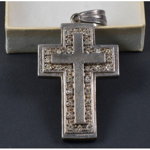 106 - A 925 Silver Cross inset with Paste Stones. Weighing: 39 grams.