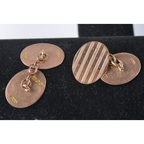 107 - A Pair of 9ct Gold Engine Turned & engraved decorated Cufflinks. Weighing: 5.5 grams.