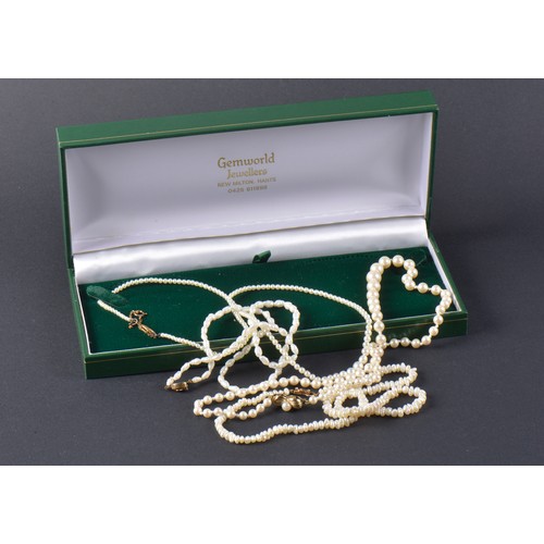 108 - A Set of Modern Cultured Pearls with a Gold Clasp along with three other sets of various pearls.