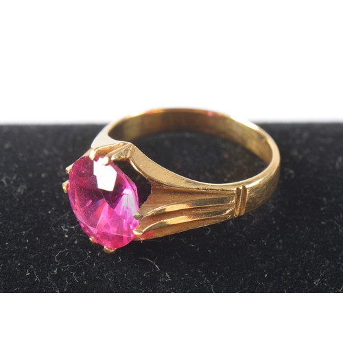 111 - A Ladies Gold Ring set with a Pink Spinel.