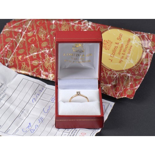 114 - A Ladies 9ct Gold Single Diamond Ring with an Original Receipt & Box.