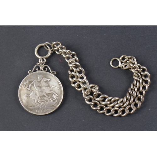 119 - A Victorian Silver Fob Chain hung with an 1889 Jubilee Silver Crown. Weighing: 70 Grams.