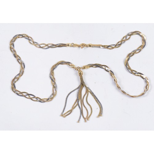 122 - A Twisted 18ct Gold Milanese Tassel Necklace in Two Tone Gold. Weighing: 11.5 grams.