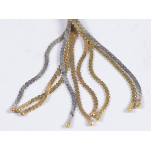 122 - A Twisted 18ct Gold Milanese Tassel Necklace in Two Tone Gold. Weighing: 11.5 grams.