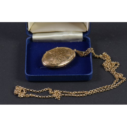 138 - A 9ct Gold Locket on a 9ct Long Gold Chain. Weighing: 15grams. Chain measuring: 60cms.