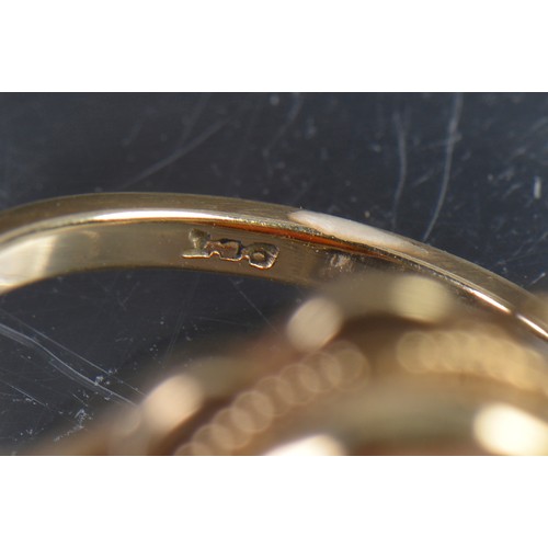 144 - A 9ct Gold Ladies Ring set with a Cameo. Weighing: 3.6 grams. Size: N.