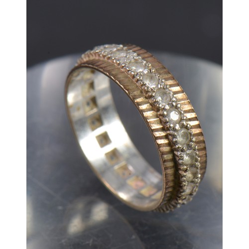 145 - A 9ct White & Yellow Gold Eternity Ring set with Chips. Weighing: 4.2 grams. Size: R.