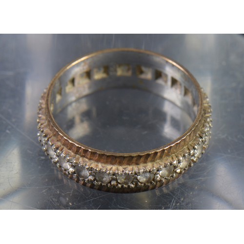 145 - A 9ct White & Yellow Gold Eternity Ring set with Chips. Weighing: 4.2 grams. Size: R.