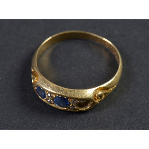 152 - An 18ct Gold Ring set with Sapphires & Diamond Chips. Weighing: 3.7 grams. Size: P/Q.