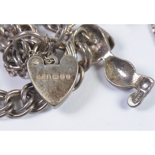 164 - A Silver Bracelet with Charms, Silver Chain, etc.