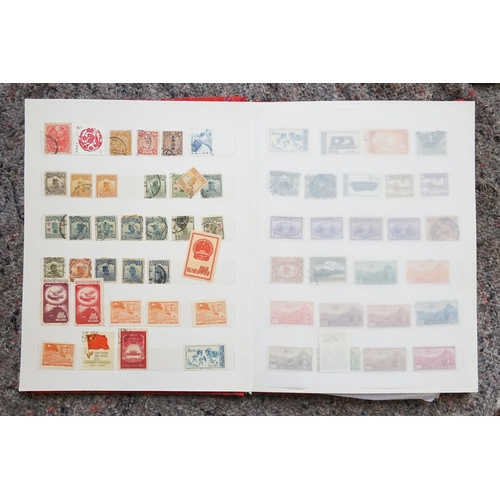 255 - A Collection of Chinese Stamps from various periods contained in a Red Silk Case.