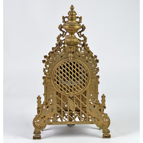 277 - A Rococo designed Metal Mantle Clock with Roman Numerals.