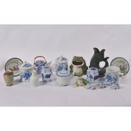 299 - A Collection of Blue & White Tea Pots, Tea Mugs with covers, Frogs, Gugglets, etc.