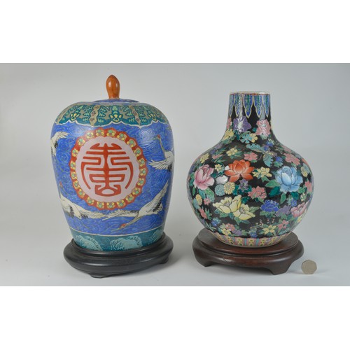 302 - A Chinese Blue Cantonese Glazed Ginger Jar & Cover decorated with a flight of cranes. Measuring: 27c... 