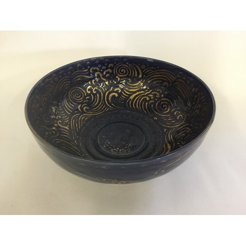 309 - A Chinese Powder Blue Ground Punch Bowl decorated with the interior in Gold of Waves & Swirls, exter... 