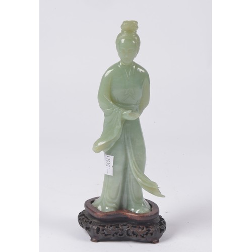 316 - A Chinese Jade Study of a Princess on Wooden Stand. Standing 20.5cms excluding stand. The head appea... 