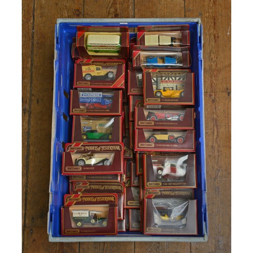 1023 - A Collection of 50 x Maroon Boxed Matchbox models of Yesteryear to include Cars, Buses, Trams & Vans... 