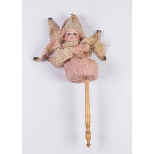 1088 - A German Bisque Headed Jester Doll in Pink with Bells & Handle.