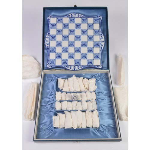 1102 - A Russian Blue & White Chess Set of Table Top Form & matching Chess Pieces contained in the Original... 