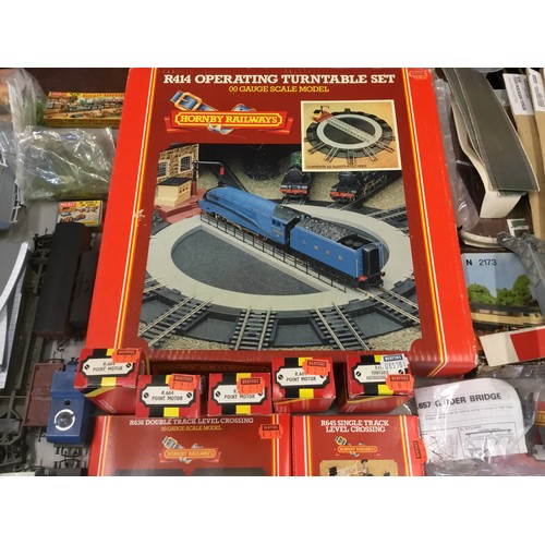 1124 - A Large Collection of OO Gauge accessories to include a Boxed Turntable, 4 x Boxed Point Motors, Tur... 