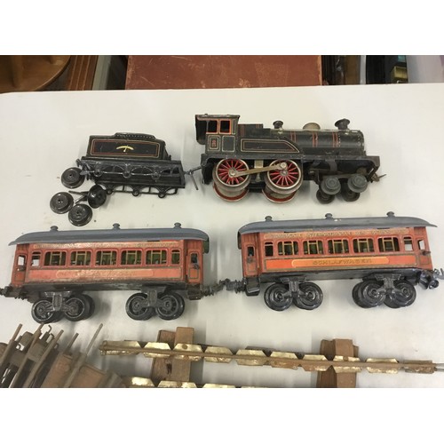 1131 - An Electric 'O' Gauge Marklin Locomotive & Tender along with Two Coaches marked 