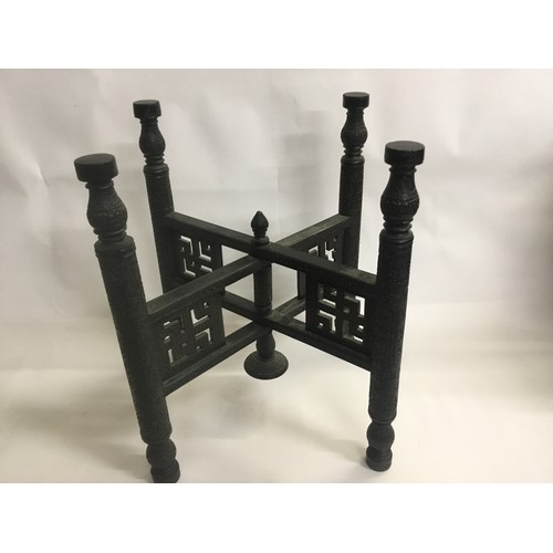 324 - A Cashmere carved Tiffin Table resting on folding stand. Measuring: 60cms x 45cms.