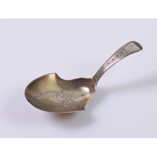 16 - A Georgian Bright Cut & Engraved Horse Show shaped Caddy Spoon by Joseph Taylor. Birmingham F. Weigh... 