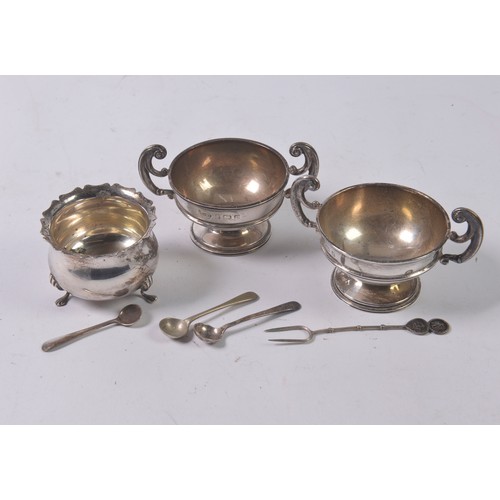 22 - A Pair of Trophy Cup Salt Cellars, a Mustard Pot & Spoons. Weighing: 161 grams.