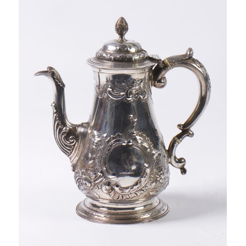 23 - A Georgian Silver & embossed Coffee Pot with insulators, Rococo design, Chased & Decorated. Hallmark... 