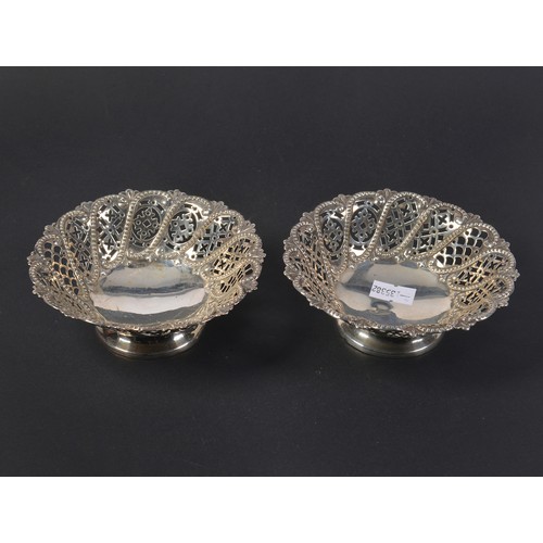 24 - A Pair of Pierced & embossed Silver Bon Bon Dishes. Weighing: 130 grams.