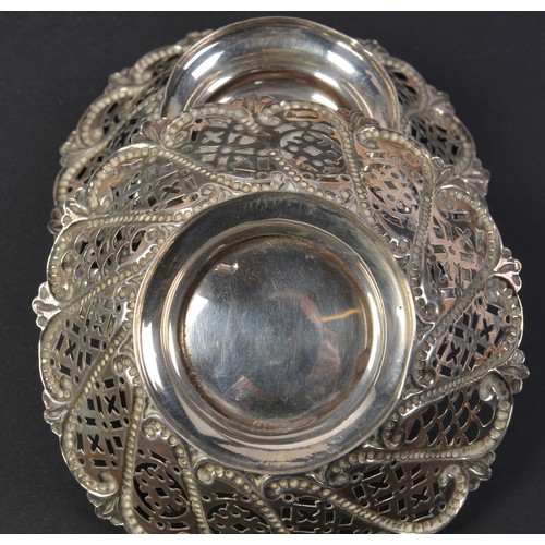 24 - A Pair of Pierced & embossed Silver Bon Bon Dishes. Weighing: 130 grams.