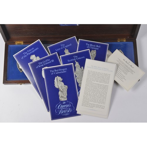 32 - A Boxed Danbury Mint set of 10 