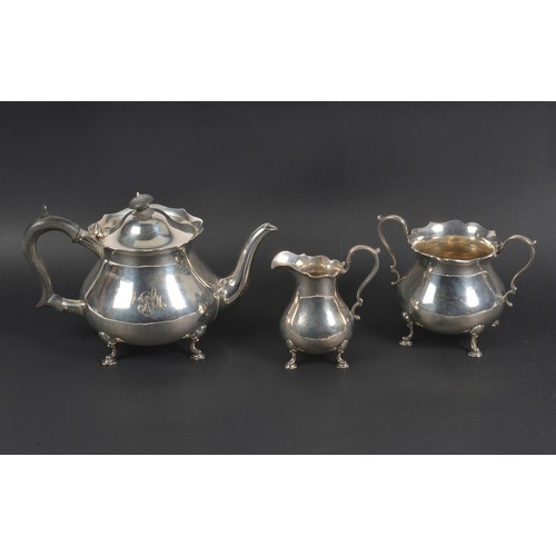 54 - A Three Piece Silver Chippendale bordered & Squat patterned Teas Set. Hallmarked Sheffield Y. Weighi... 