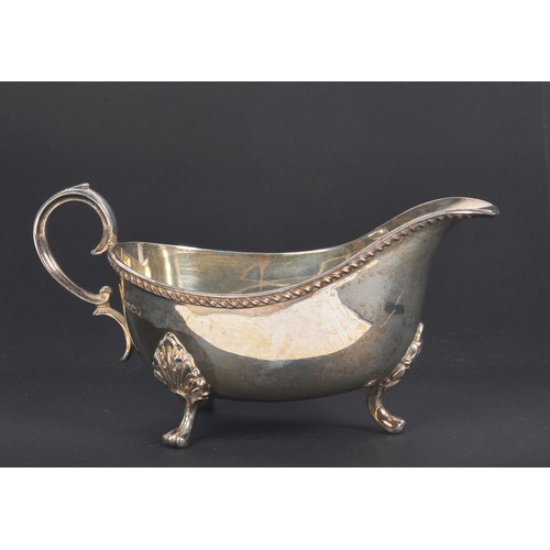 55 - A Silver Sauce Boat with a Heavy Cast Edge, Sheffield Z. Weighing: 210 grams.