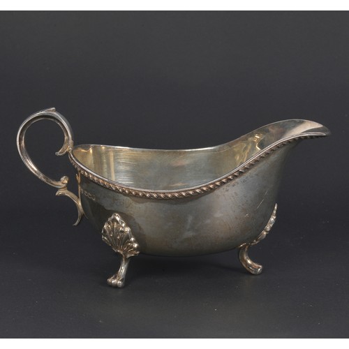 55 - A Silver Sauce Boat with a Heavy Cast Edge, Sheffield Z. Weighing: 210 grams.