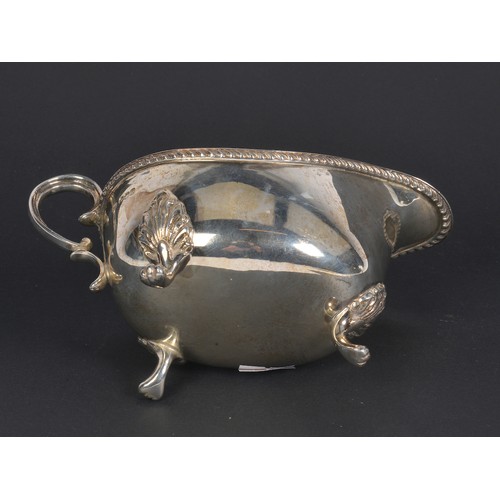 55 - A Silver Sauce Boat with a Heavy Cast Edge, Sheffield Z. Weighing: 210 grams.