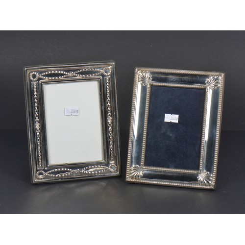 61 - Two Silver Photo Frames. Measuring: 9cms x 13cms. (Picture Size).