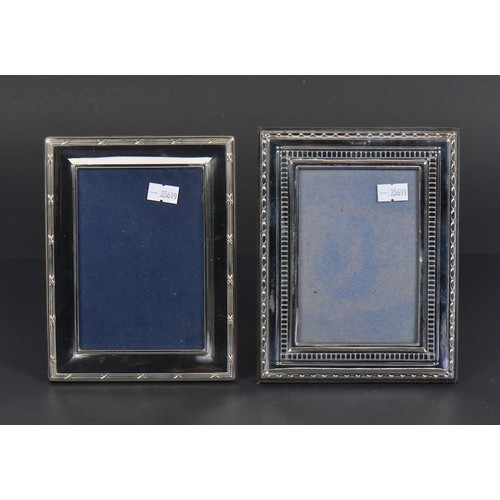 62 - Two Silver Photo Frames. Measuring: 9cms x 13cms. (Picture Size).