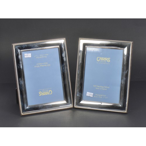 63 - Two Silver Picture Frames. Measuring: 18cms x 13cms. (Picture Size).