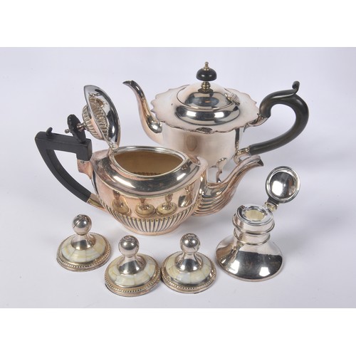 104 - A Silver Plated Tea Tray, a Silver Plated Italian stand with Cupid, Coffee Pots, Place settings, etc... 