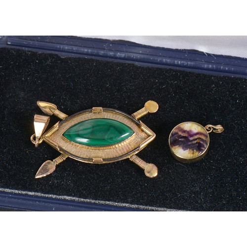 194 - A Kenyan Shield shaped Zulu pendent mounted with Malachite. Weighing: 9.2 grams along with a 9ct Gol... 