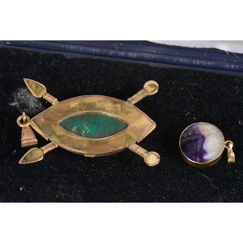 194 - A Kenyan Shield shaped Zulu pendent mounted with Malachite. Weighing: 9.2 grams along with a 9ct Gol... 