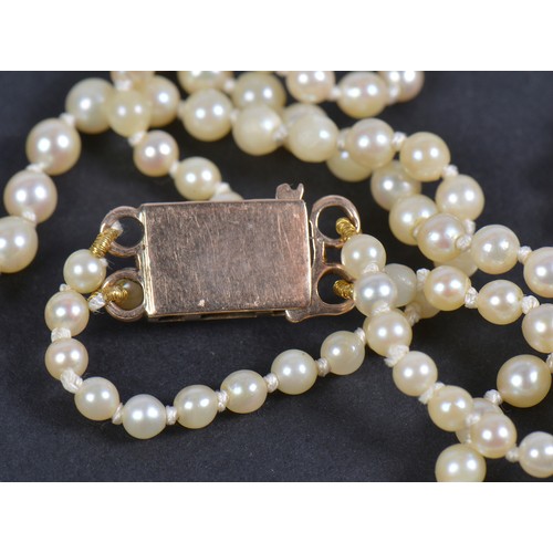 200 - A Twin Pearl Necklace with an engraved clasp.